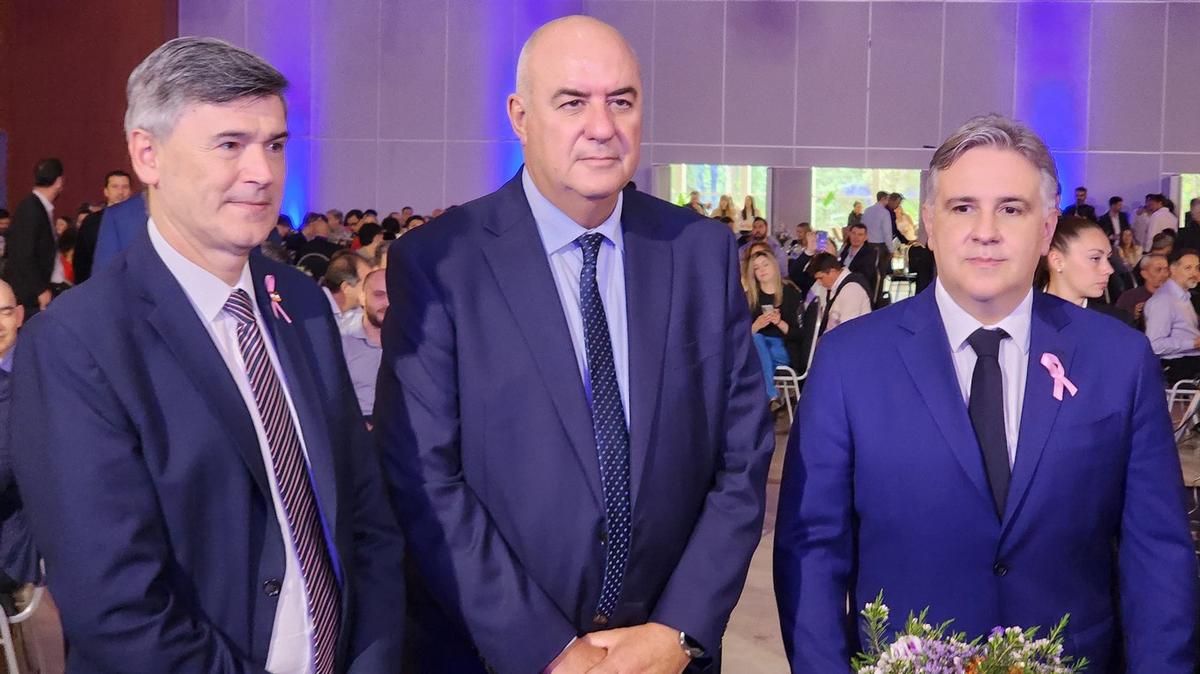 FOTO: Daniel Passerini, Luis Macario y Martín Llaryora, en el 16° Coloquio de la UIC.