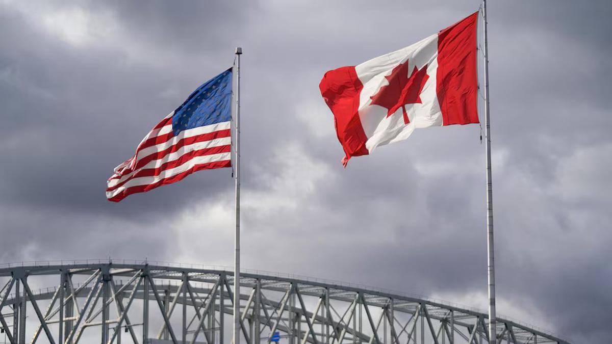 Las banderas de EE. UU. y Canadá.