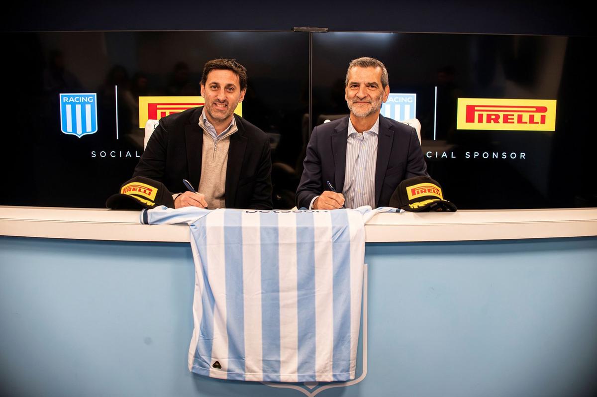 D.Milito (Racing) y M.Canineo (Pirelli)