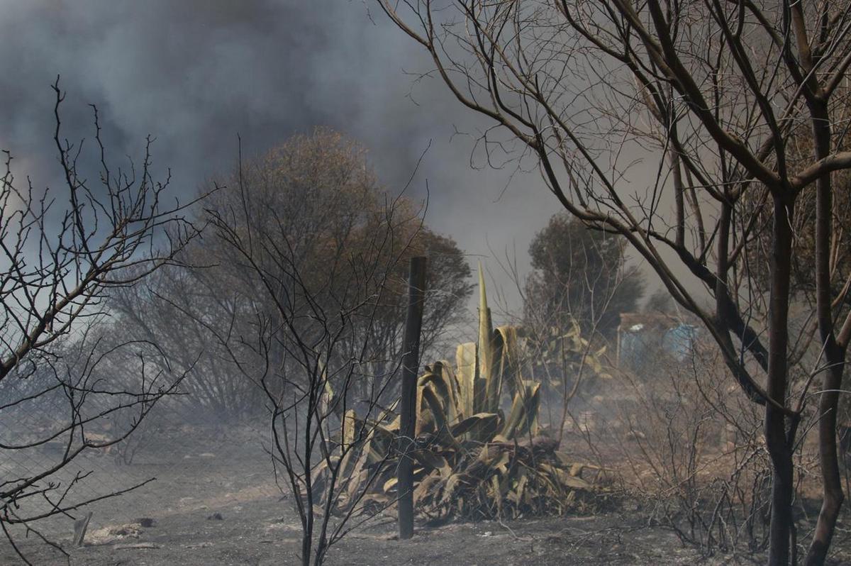 FOTO: Desesperación por los incendios en Los Cocos. (Foto: Daniel Cáceres/Cadena 3)