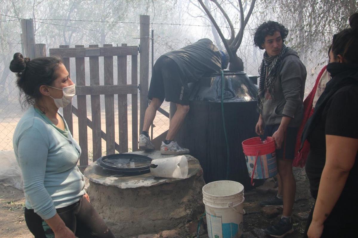 FOTO: Desesperación por los incendios en Los Cocos. (Foto: Daniel Cáceres/Cadena 3)