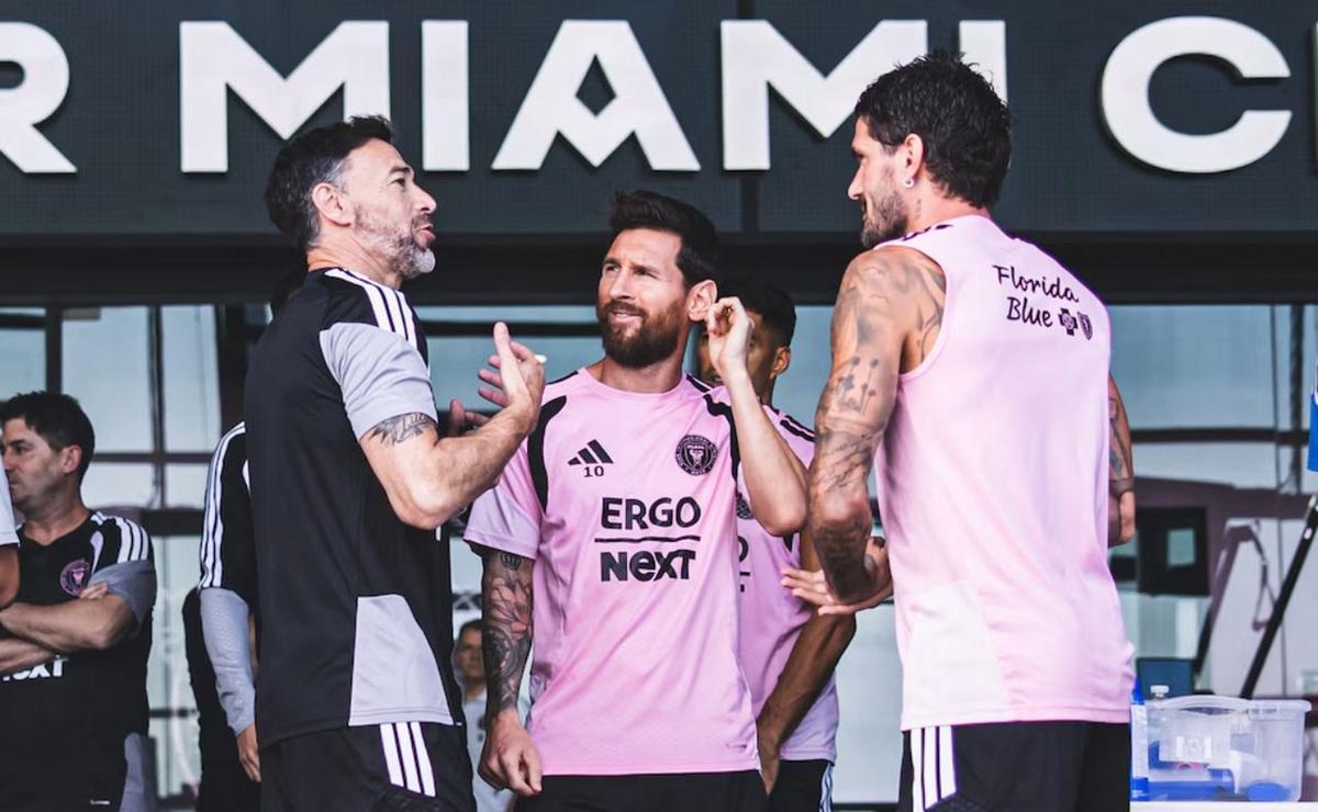 Kily González junto a Lionel Messi.