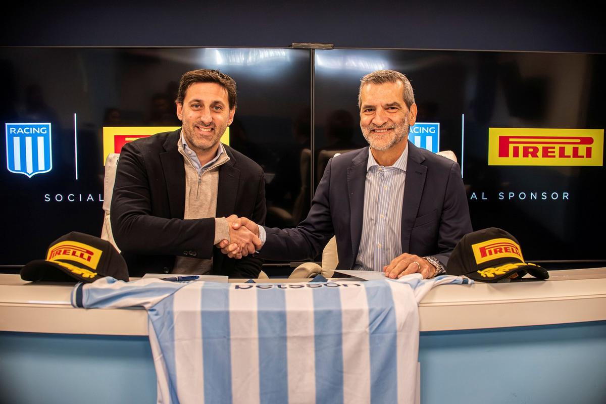 D.Milito (Racing) y M.Canineo (Pirelli)