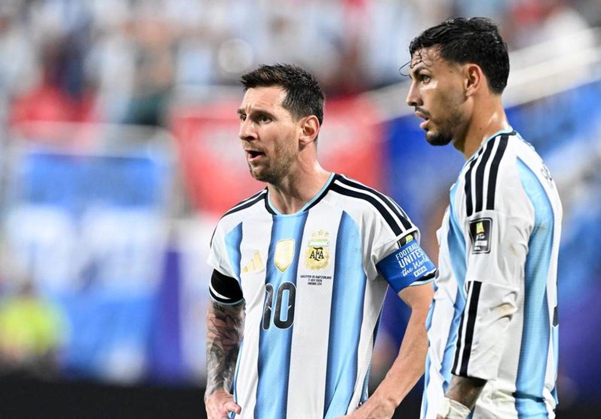 Leandro Paredes y Lionel Messi.