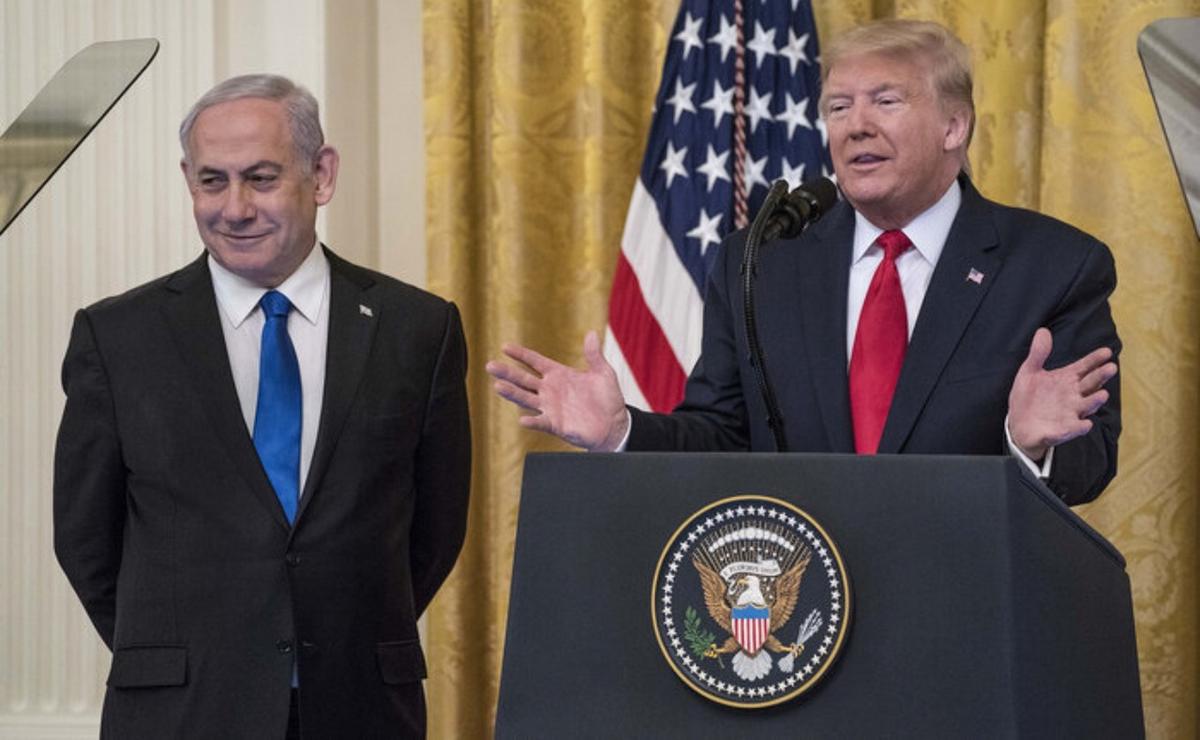 El primer ministro de Israel, Netanyahu, junto a Donald Trump (Foto: AFP).