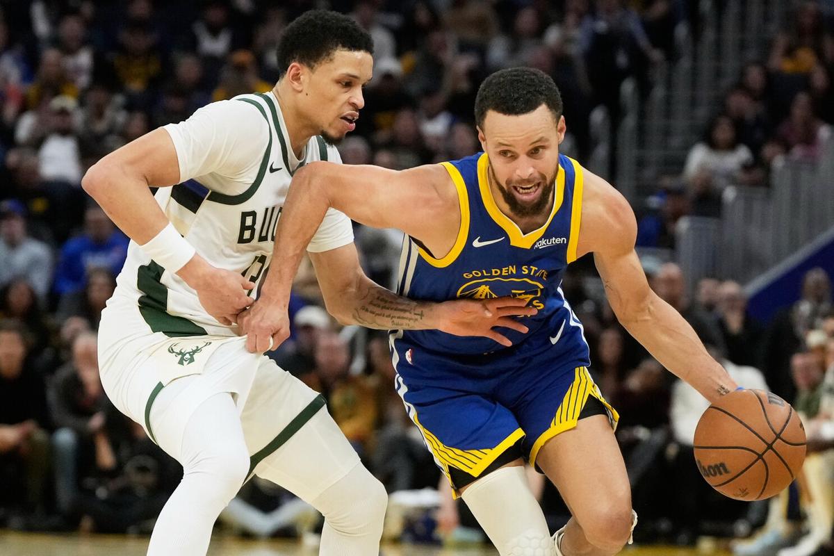 Stephen Curry y Jimmy Butler lideran a Warriors en victoria 120-113 sobre Bucks